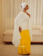 The Maryam Yellow & White Co-ord Set blends hand embellishment with elegant satin. Shop modest luxury co-ords at Sonjiki UK.