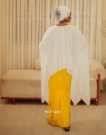 The Maryam Yellow & White Co-ord Set blends hand embellishment with elegant satin. Shop modest luxury co-ords at Sonjiki UK.