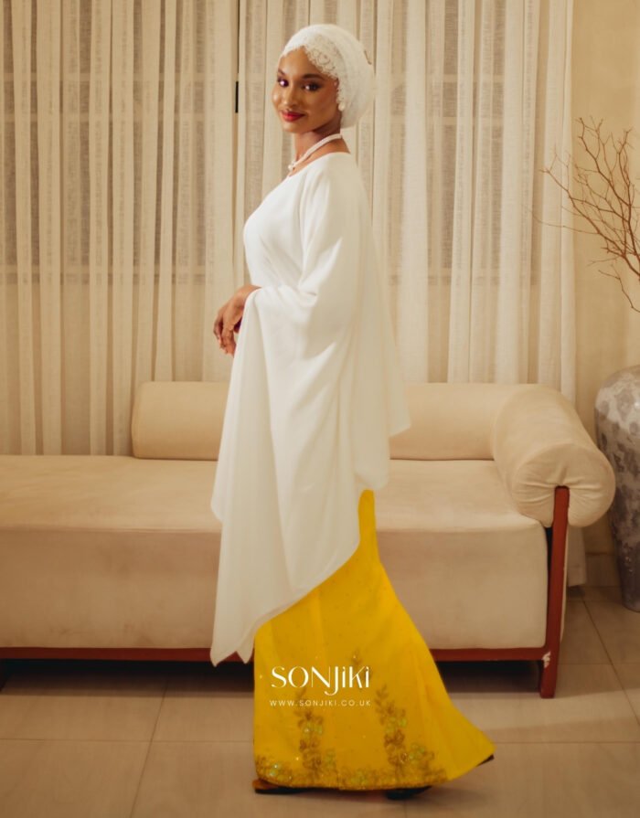 The Maryam Yellow & White Co-ord Set blends hand embellishment with elegant satin. Shop modest luxury co-ords at Sonjiki UK.