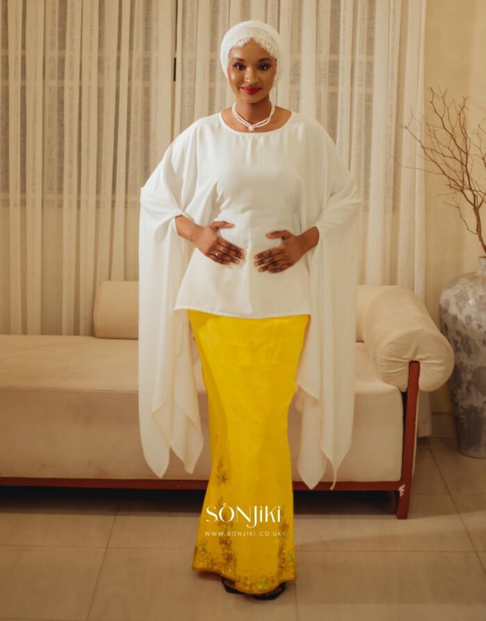 The Maryam Yellow & White Co-ord Set blends hand embellishment with elegant satin. Shop modest luxury co-ords at Sonjiki UK.