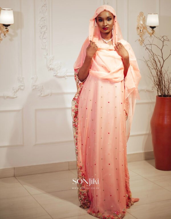 Discover the Safiya Peach Embroidered Chiffon Boubou at Sonjiki. Includes inner dress and veil. Perfect modest African-inspired celebration wear for UK Muslim women.