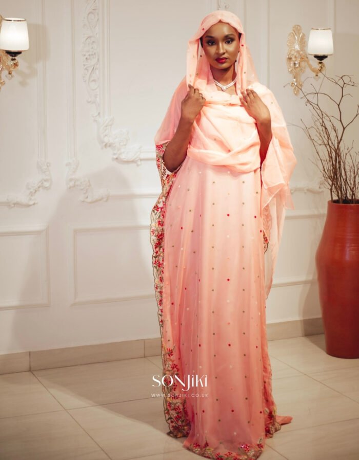 Discover the Safiya Peach Embroidered Chiffon Boubou at Sonjiki. Includes inner dress and veil. Perfect modest African-inspired celebration wear for UK Muslim women.