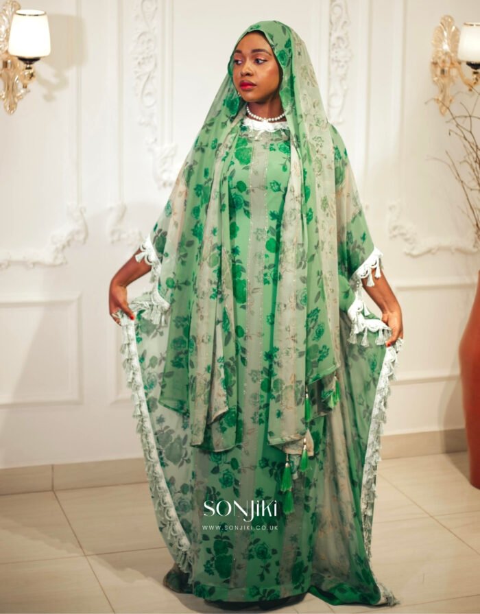 Shop the Hiba Green Floral Boubou at Sonjiki. Features tassel details, inner dress and matching veil. Modest luxury for UK-based cultural celebrations.