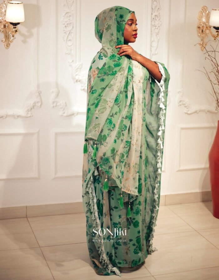 Shop the Hiba Green Floral Boubou at Sonjiki. Features tassel details, inner dress and matching veil. Modest luxury for UK-based cultural celebrations.