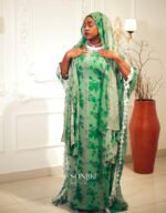 Shop the Hiba Green Floral Boubou at Sonjiki. Features tassel details, inner dress and matching veil. Modest luxury for UK-based cultural celebrations.